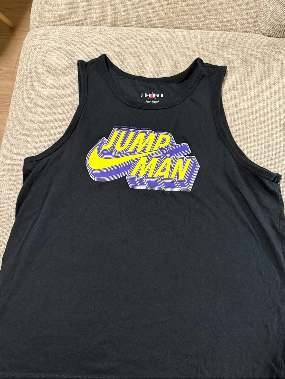 Jordan Black Graphic 'JUMP' Short Sleeve Tee with Yellow & Purple Print